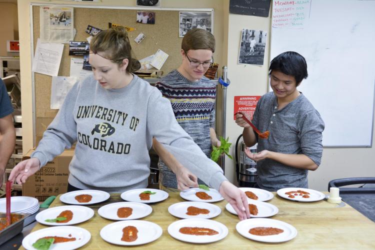 Students cooking.