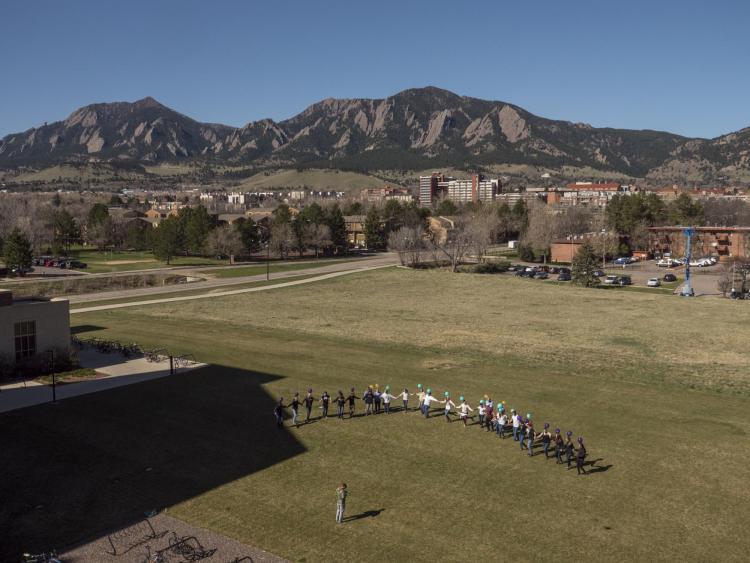 Students participate in RNA splicing interpretive dance. Photo by Glenn Asakawa.