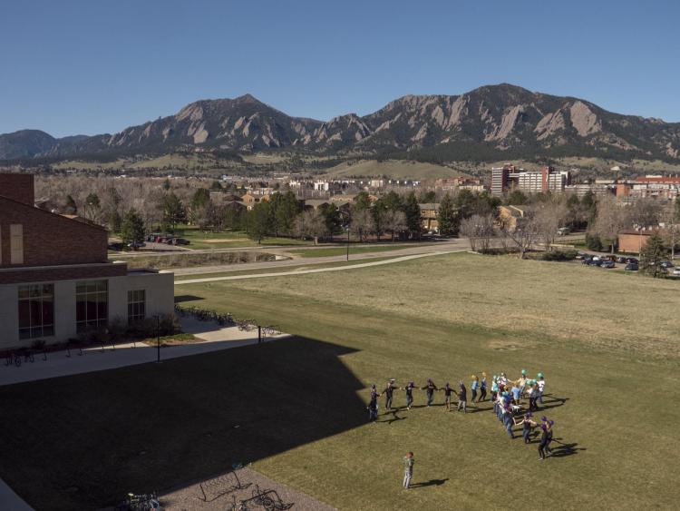 Students participate in RNA splicing interpretive dance. Photo by Glenn Asakawa.