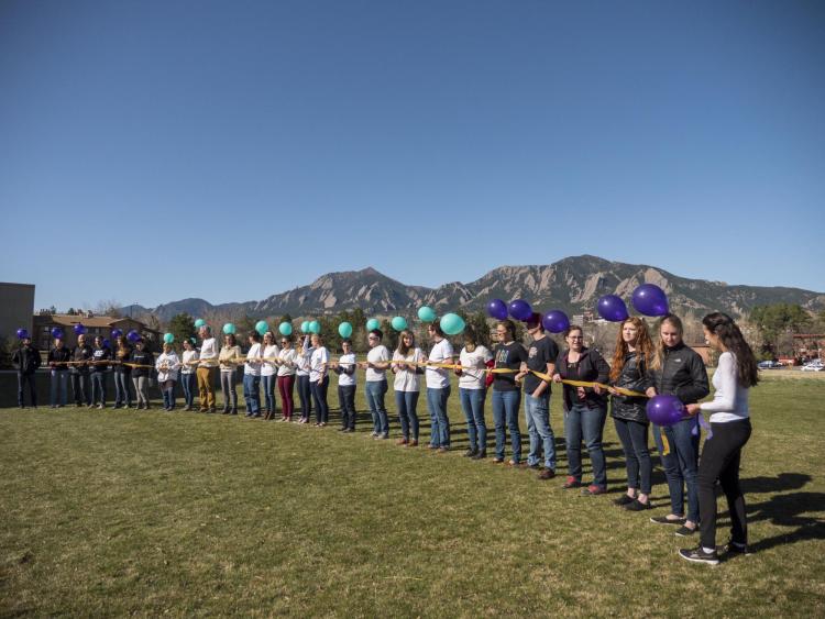 Students participate in RNA splicing interpretive dance. Photo by Glenn Asakawa.