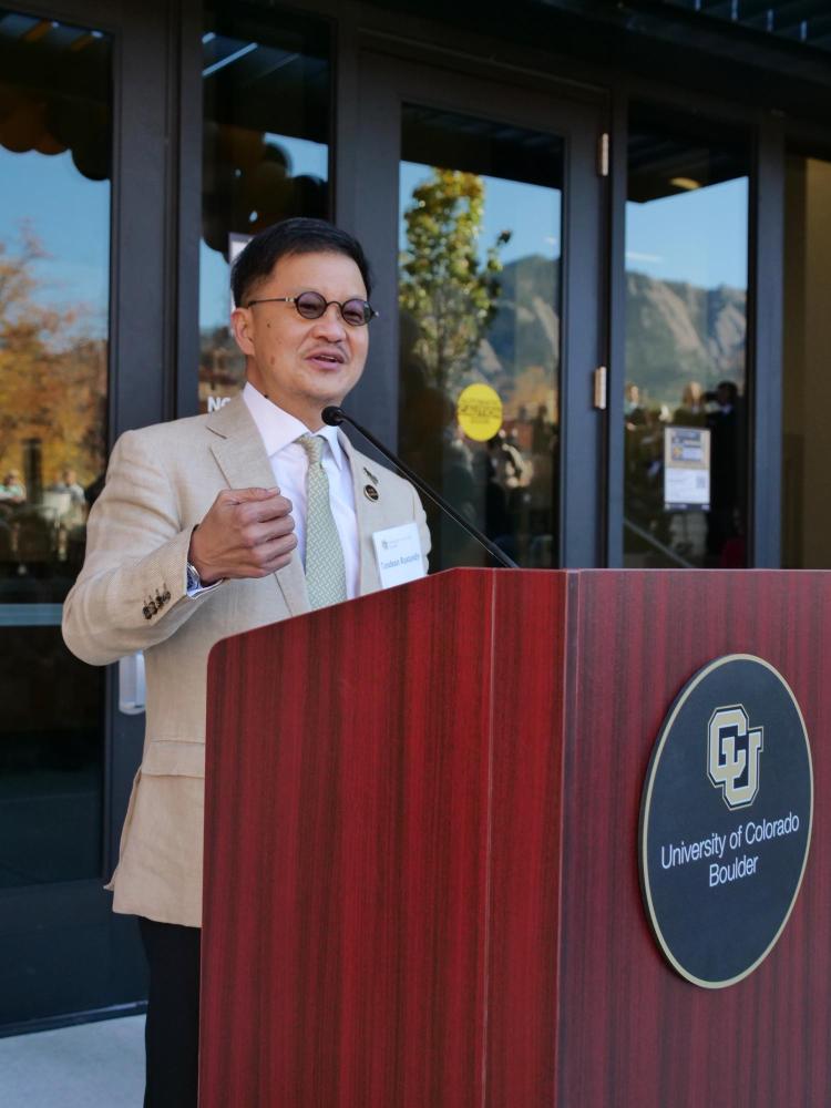 Tandean Rustandy speaks during the grand opening event