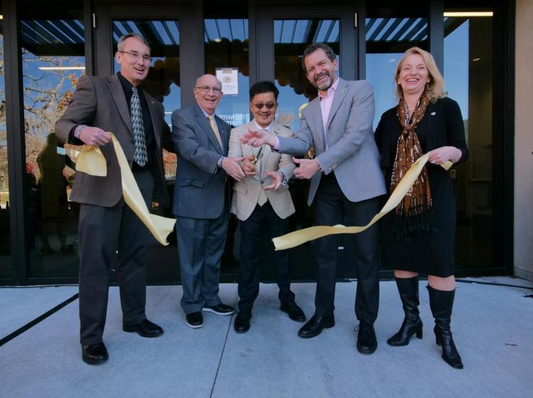 Interim Engineering Dean Keith Molenaar, Chancellor Phil DiStefano, Tandean Rustandy, CU Interim President Todd Saliman and Leeds School of Business Dean Sharon Matusik