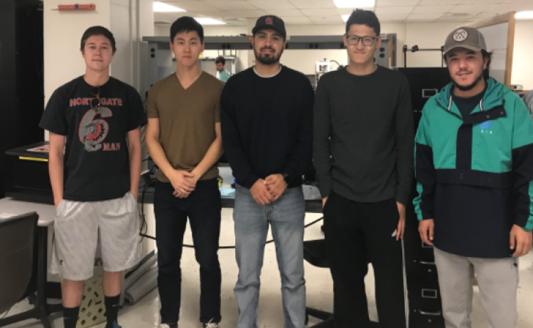 Five engineering students who are developing Pulse, an advanced sensory system for the blind