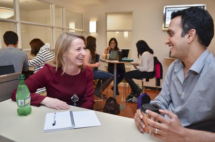 Sharon Matusik working with a student