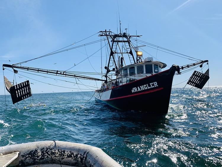 A shrimp boat sails off the coast of Oregon