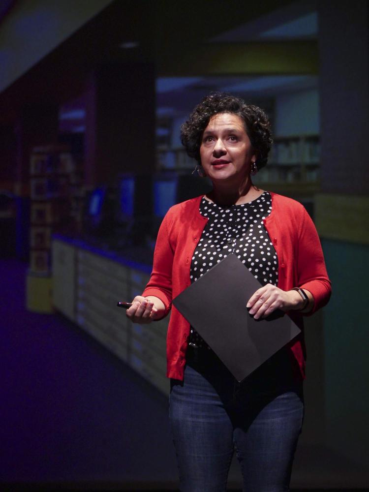 Manuela Sifuentes, CU Engage director of community partnerships, speaks to the crowd during the School of Education's Ed Talks, held at the Dairy Arts Center. Photo by Patrick Campbell.