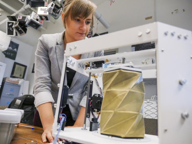 Anastasia Muszynski works with inflatable origami device