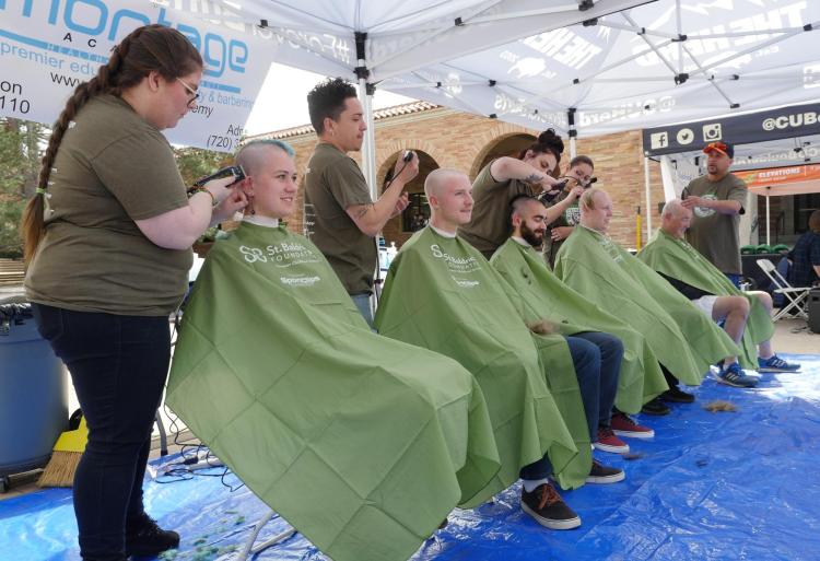 Students participate in the St. Baldrick's event outside the UMC. Photo by Casey A. Cass.