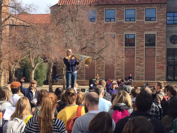 Graduate student Liz Marasco speaks at a rally on campus November 2017