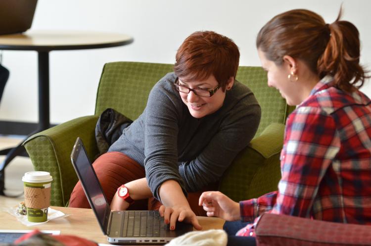 Student employee tutoring another student