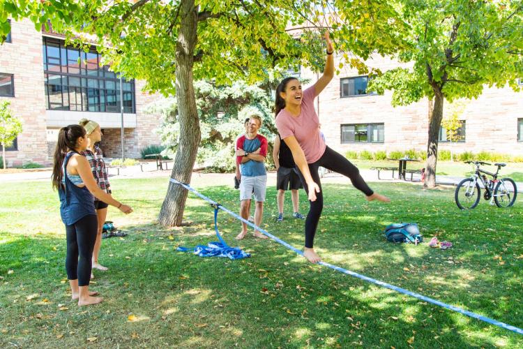 Students slacklining