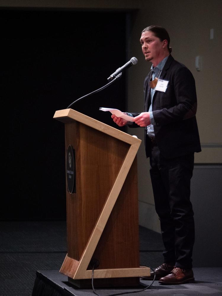 Clint Carroll, associate professor of ethnic studies at CU Boulder, speaks to the crowd during The Chancellor’s Annual Summit.
