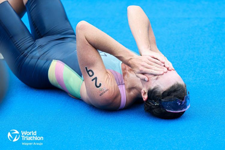 Flora Duffy reacts after winning the women's triathlon gold medal at the 2020 Summer Olympics. (Photo credit: World Triathlon)