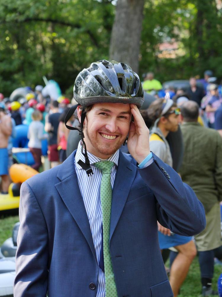 Media Relations Manager Andrew Sorensen prepares for his ride down the creek