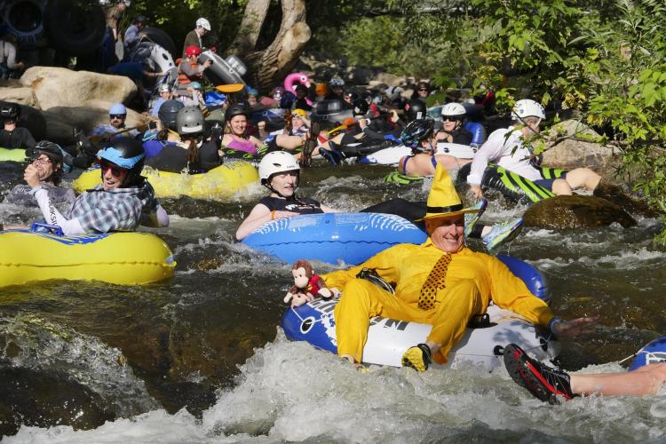 Tubers ride the Boulder Creek for Tube to Work Day 2018