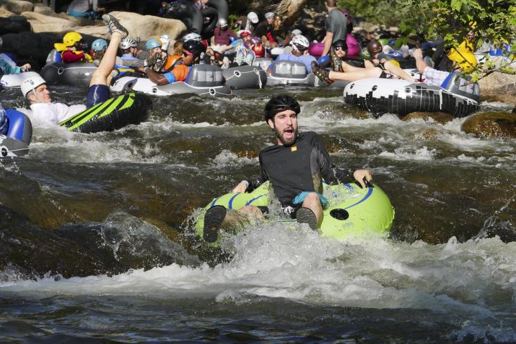 Tubers ride the Boulder Creek for Tube to Work Day 2018