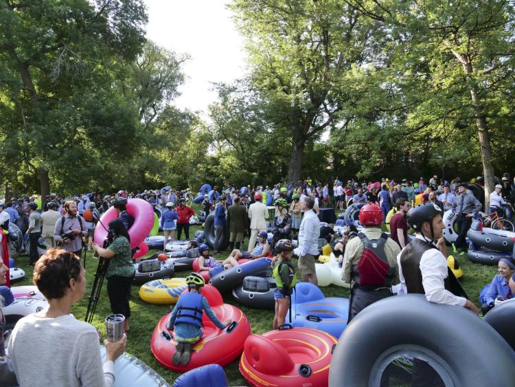 Tubers ride the Boulder Creek for Tube to Work Day 2018