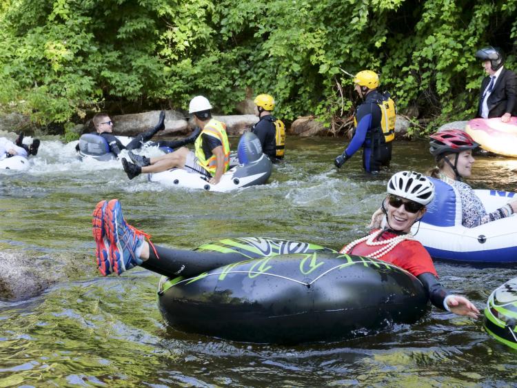 Tubers ride the Boulder Creek for Tube to Work Day 2018
