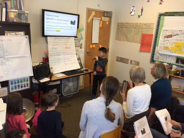 A student presents design ideas.
