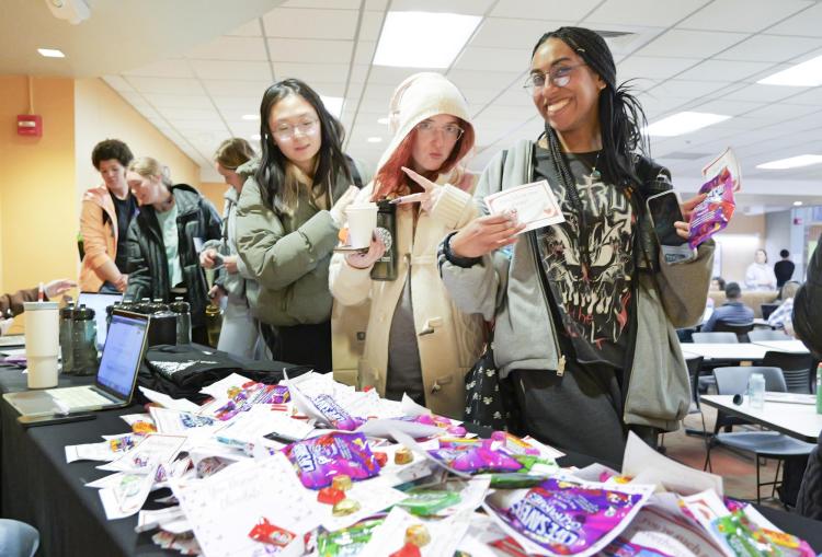 Students partake in the I Love Mondays candy and valentines giveaway