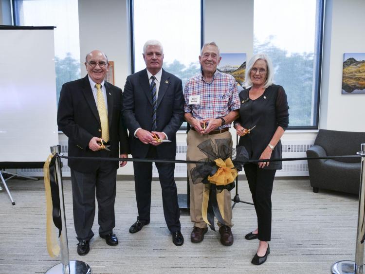 Left to right: Chancellor DiStefano, Director of Veteran and Military Affairs Stew Elliott, former Regent Steve Bosley, and Regent Sue Sharkey pose for a photo before ribbon cutting