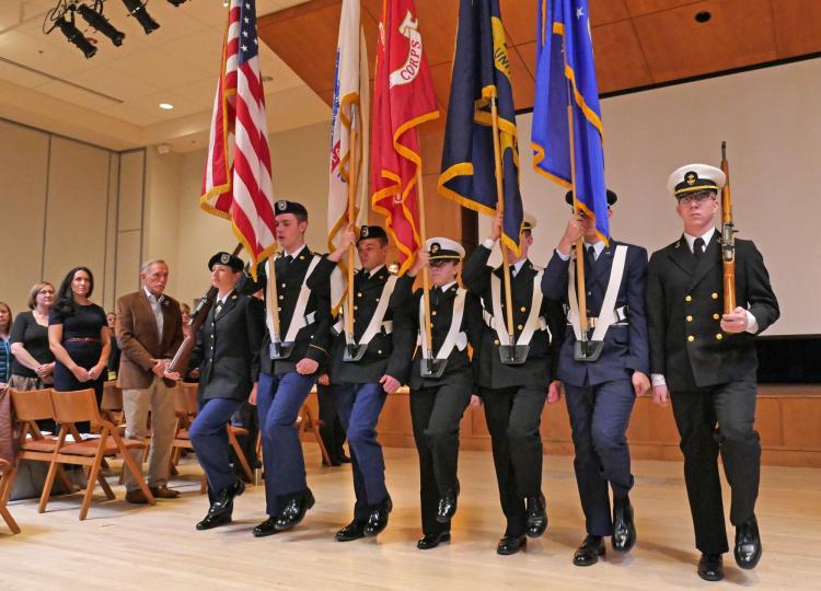 The Joint ROTC Color Guard presents during the Veterans Day Ceremony in the University Memorial Center. Photo by Casey A. Cass.