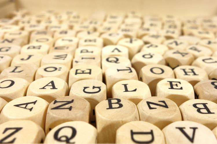 Wooden letter cubes (stock image).