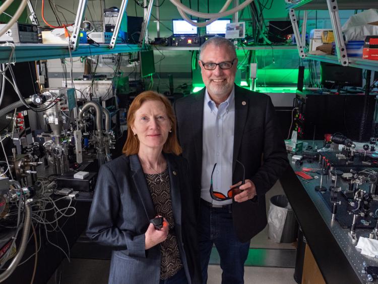 Margaret Murnane and Henry Kapteyn in their lab on campus
