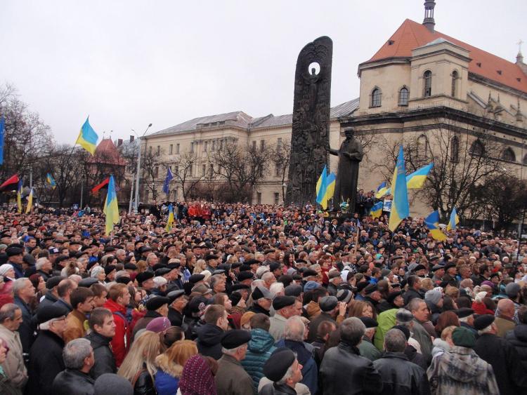 Protestors waving European Union flags