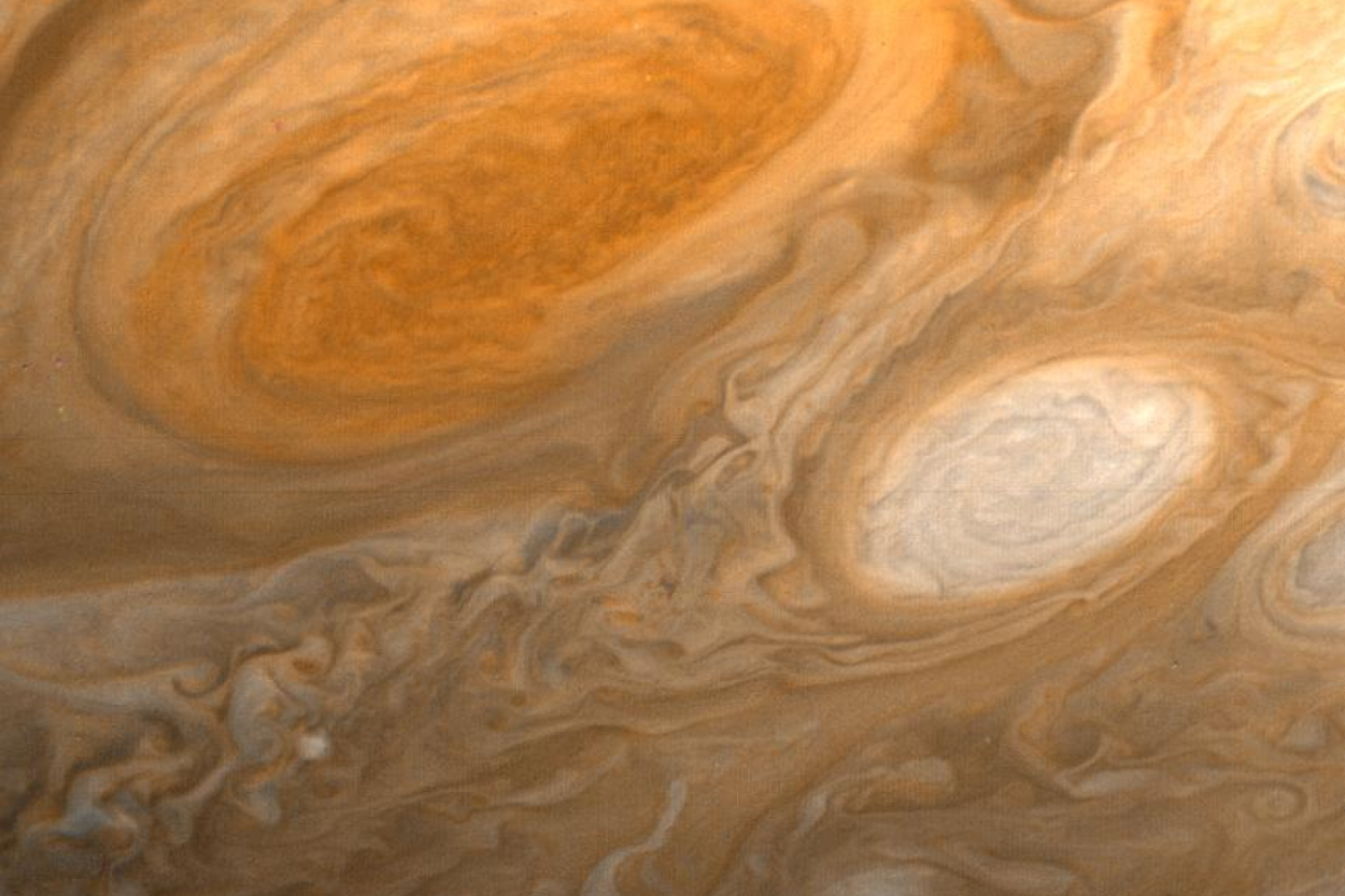 Image of a red spot blotting the surface of Jupiter