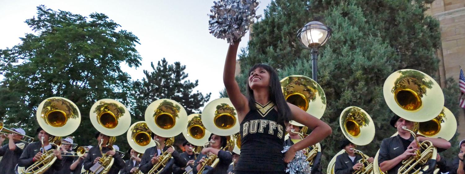 CU Boulder homecoming Stampede with marching band downtown 