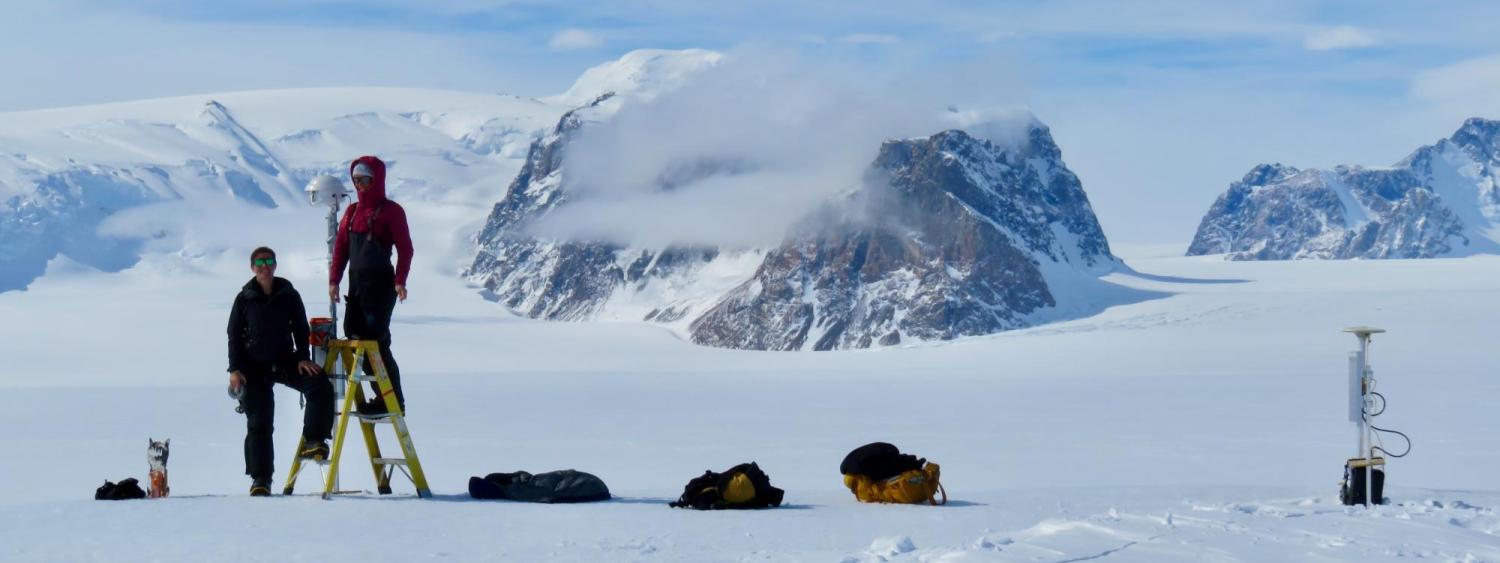 Researchers taking photos in Antarctica