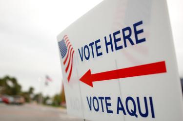 Sign with arrow pointing to voting area