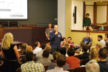 CU Boulder Entrepreneur in Residence Nigel Sharp addresses the audience at a New Venture Challenge event.