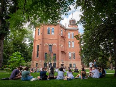 Students enjoying class outside on the first day of classes.