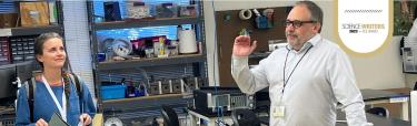 A professor introduces his research to attendees