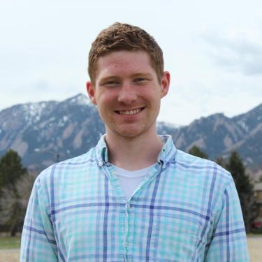 Marc Thomson in front of Flatirons