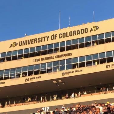 Folsom Stadium and a bluebird sky