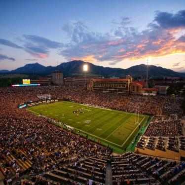 Sunset over Folsom Field during a game