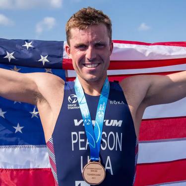 Morgan Pearson poses with American flag