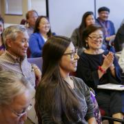 Attendees listen to a breakout session