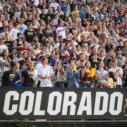 Fans cheer on the Buffs in a packed Folsom Field stadium