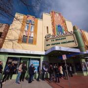 Community members line up outside Boulder Theater for the 2019 New Venture Challenge championships