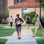 students walking on campus