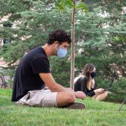 Students, staff and faculty, all wearing facial coverings and practicing proper social distancing protocols, participate in classes and study on the first day of the 2020 Fall semester on the CU Boulder Campus. (Photo by Glenn Asakawa/University of Colorado)