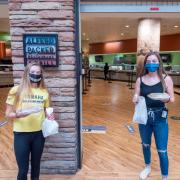 Students pick up food from Alferd Packer Grill