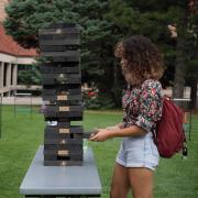 Students playing lawn Jenga at a CU event