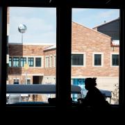 silhouette of a student studying in the CASE building