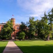 Old Main and trees on campus