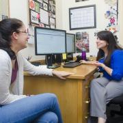 Student talks with academic advisor